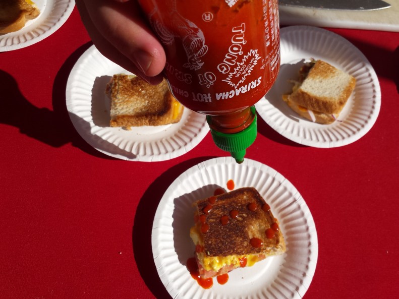 Extra sriracha on that Greenspans Grilled Cheese, please!